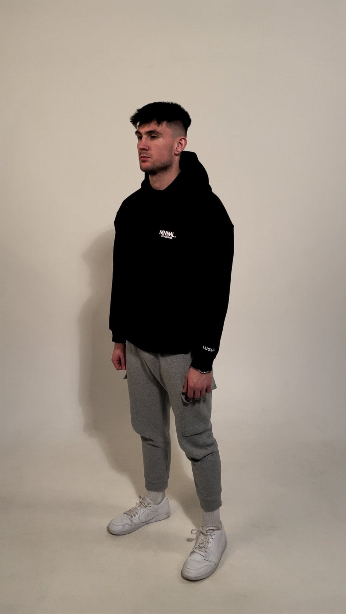 Oversized 'MNIML' Hoodie - Black - LUGHA. Clothing - Hoodie